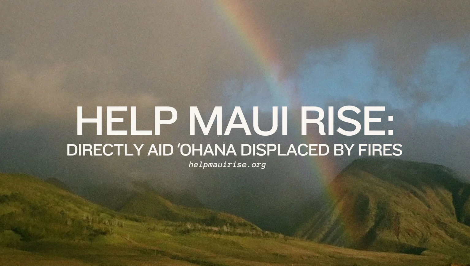 A rainbow over green hills with the words “Help Maui Rise: Directly aid ‘Ohana displaced by fires”.